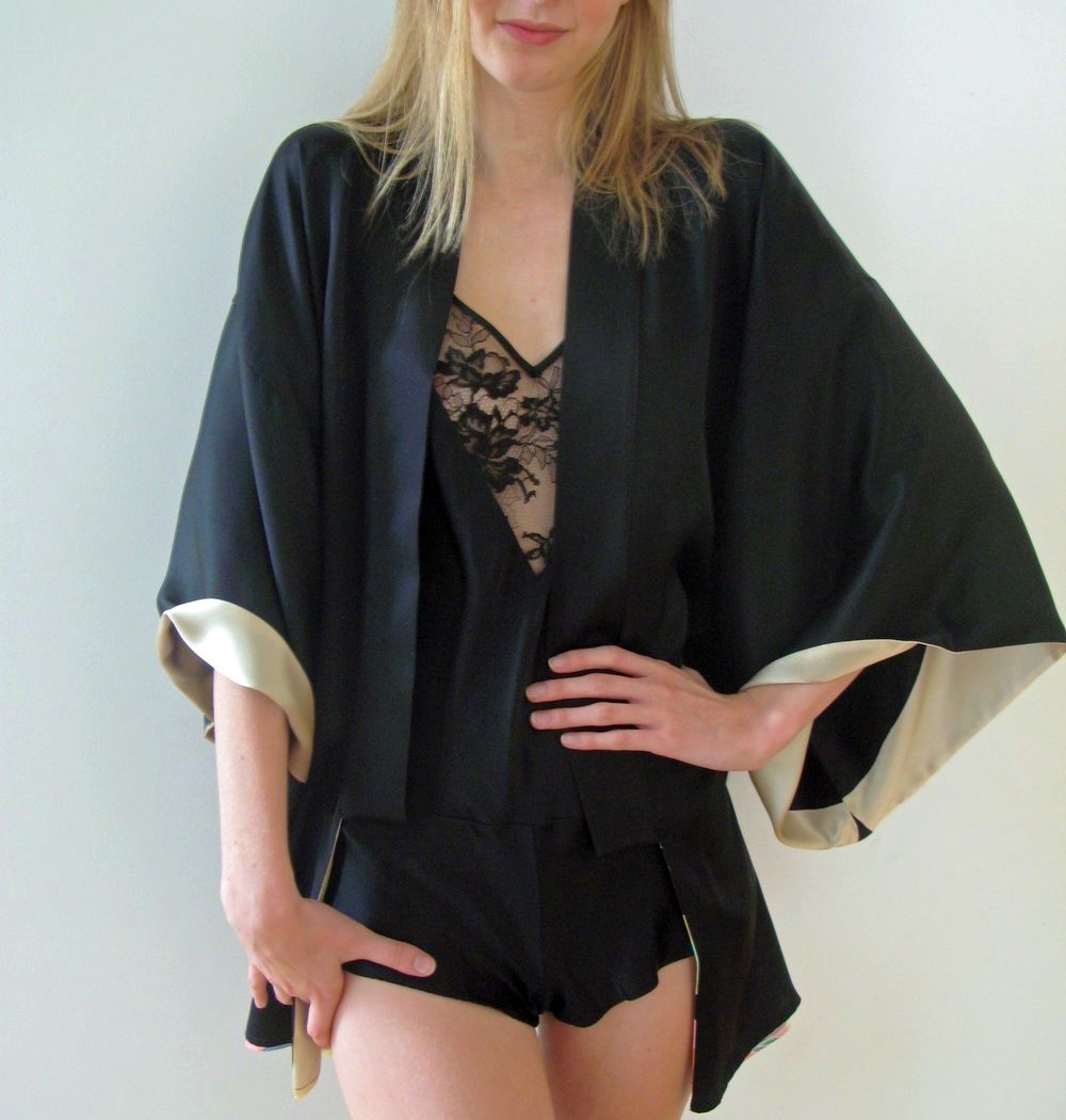 Model In Black Lace Playsuit And Black Kimono
